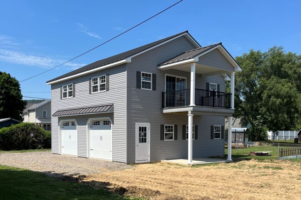 28x32 Mega garage with apartment by Storage Sheds and Garages
